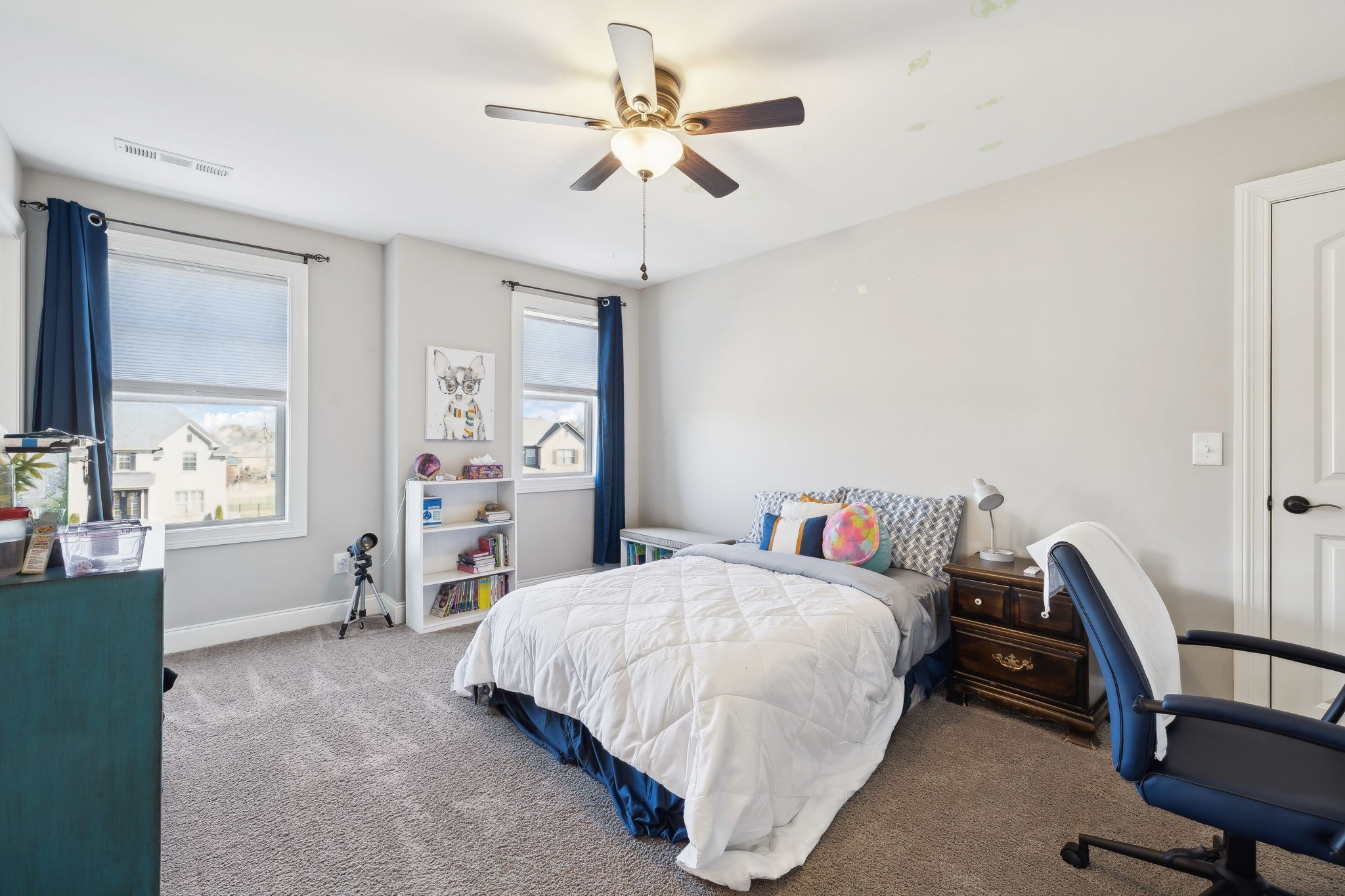 109 Watermill Lane Lebanon, TN 37087 - Photo 50 of 69 a bedroom with a bed a chair and a chandelier