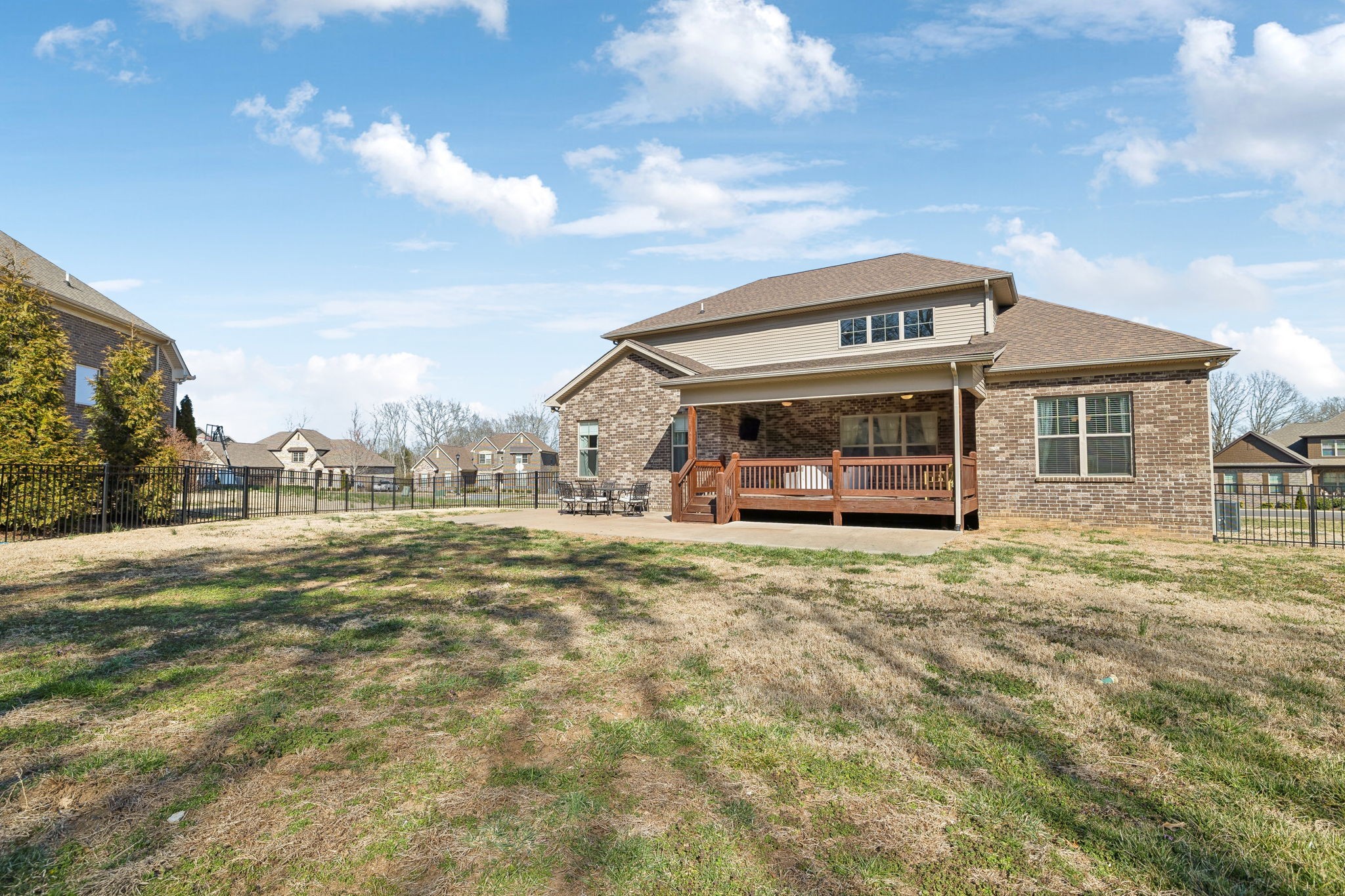 109 Watermill Lane Lebanon, TN 37087 - Photo 57 of 69 a view of a large white house with a big yard and large trees