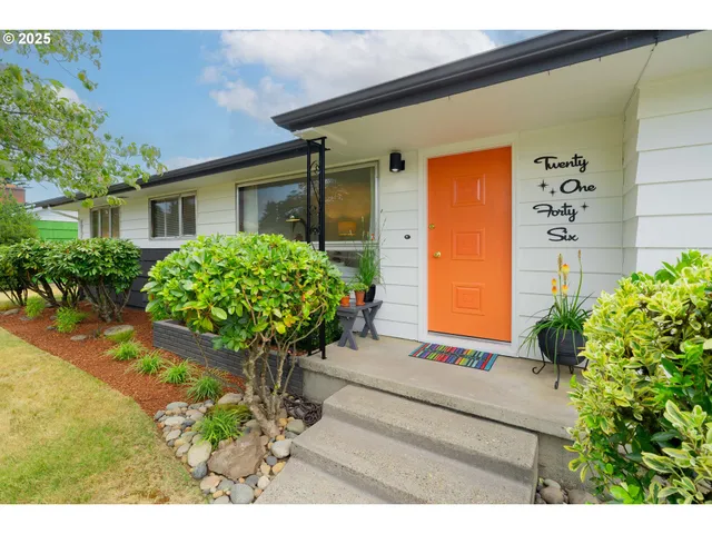 a front view of a house with garden