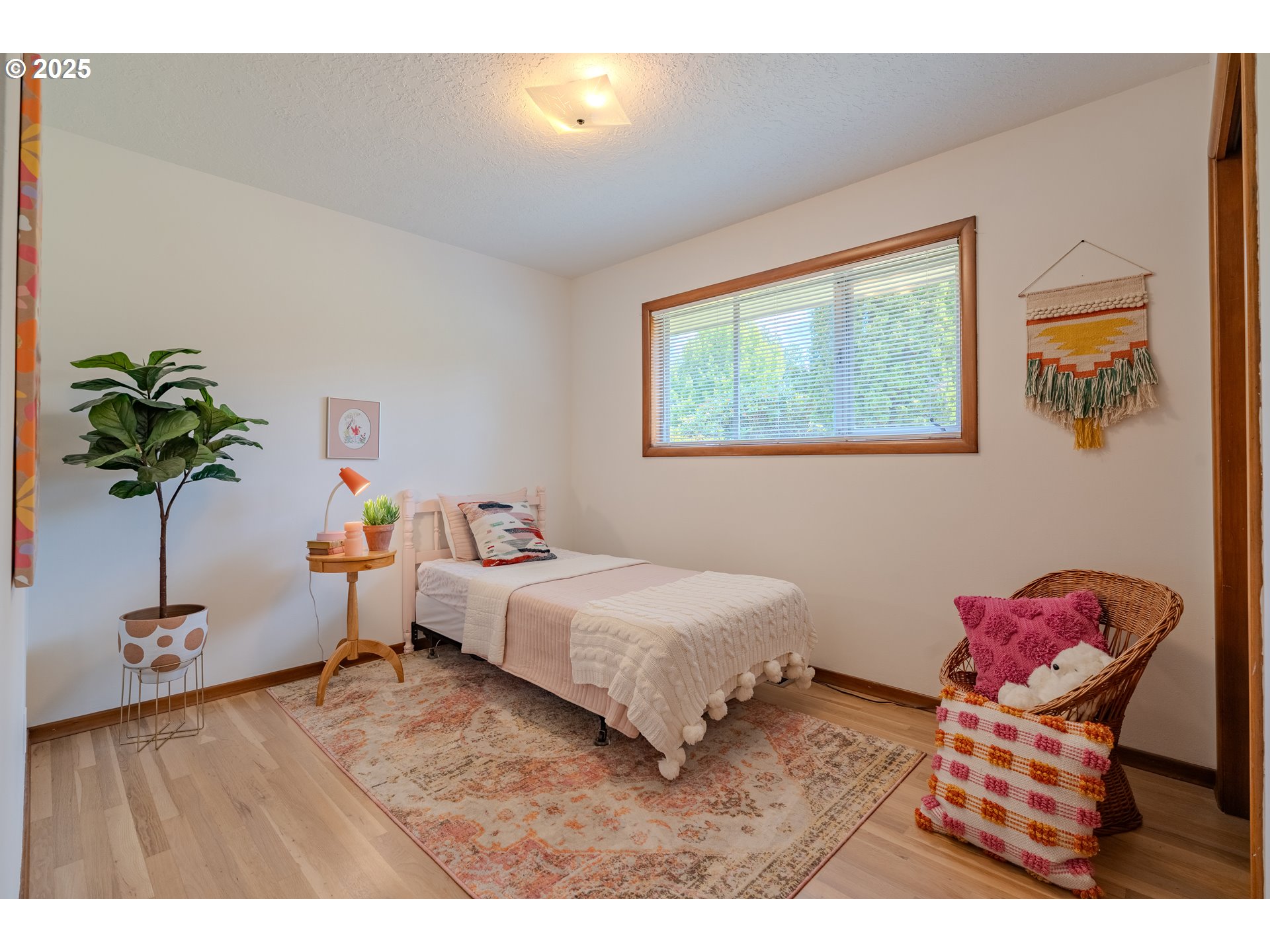 2146 Southeast 185th Avenue Gresham, OR 97233 - Photo 21 of 48 a living room with furniture and a potted plant