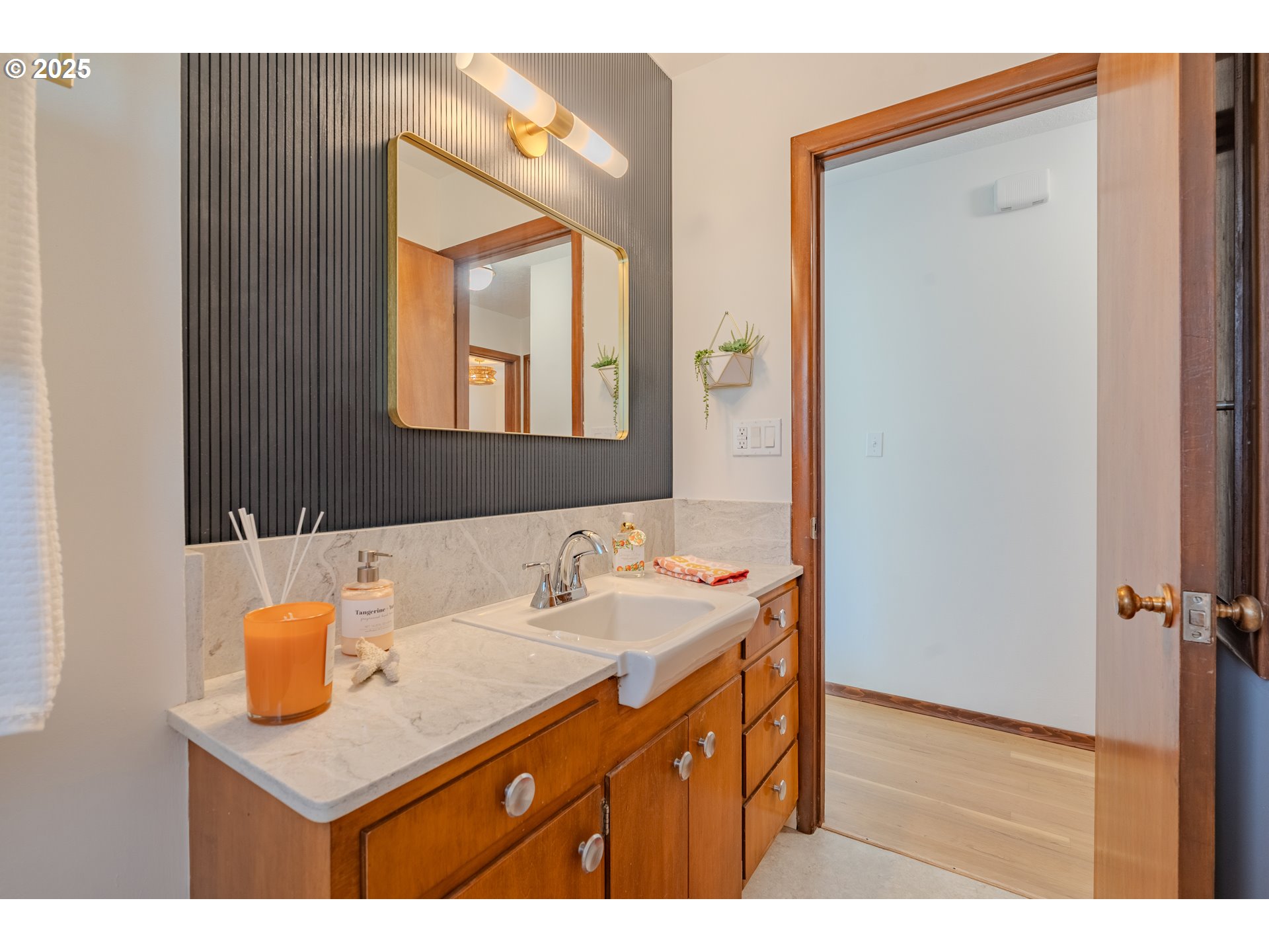 2146 Southeast 185th Avenue Gresham, OR 97233 - Photo 25 of 48 a bathroom with a sink a mirror and a vanity