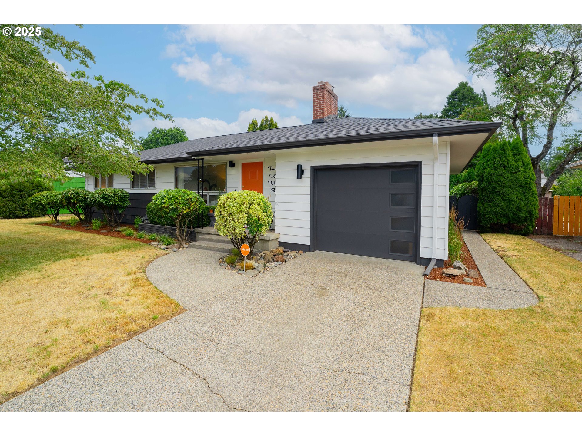 2146 Southeast 185th Avenue Gresham, OR 97233 - Photo 4 of 48 a view of a house with backyard and garden