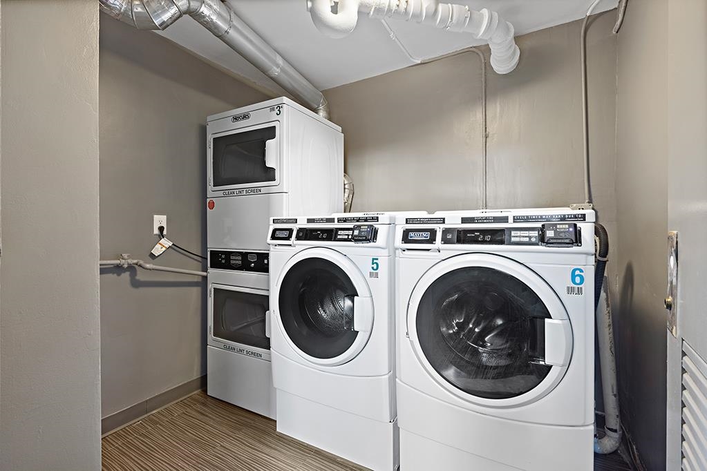 380 Mountain Road, Unit 907 Union City, NJ 07087 - Photo 22 of 25 a utility room with dryer and washer