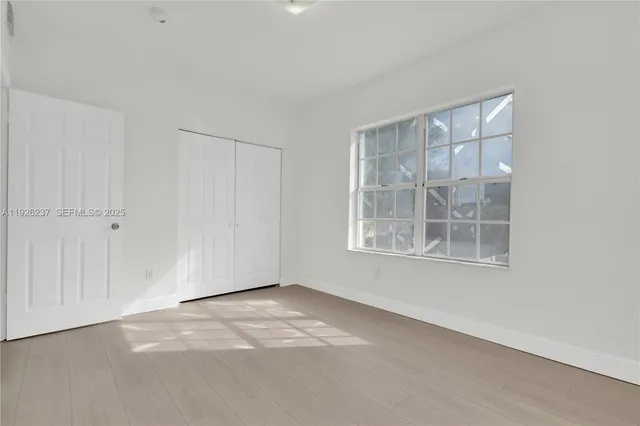 an empty room with windows