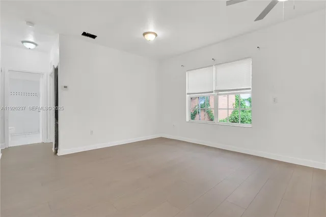 an empty room with windows