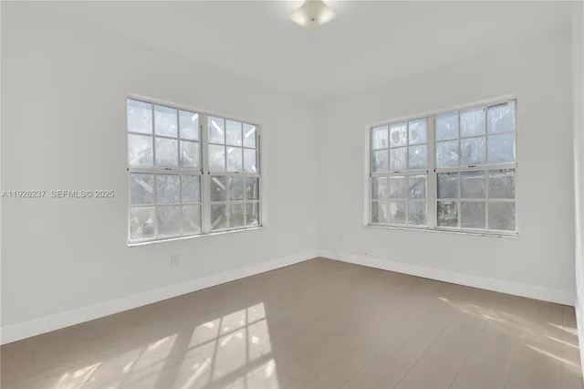 an empty room with a window