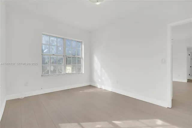 an empty room with a window