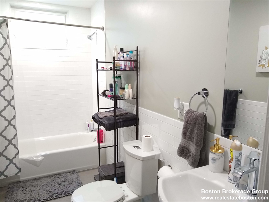 17 Ashley Street, Unit 2 Boston, MA 02130 - Photo 5 of 5 a bathroom with a toilet and a bathtub
