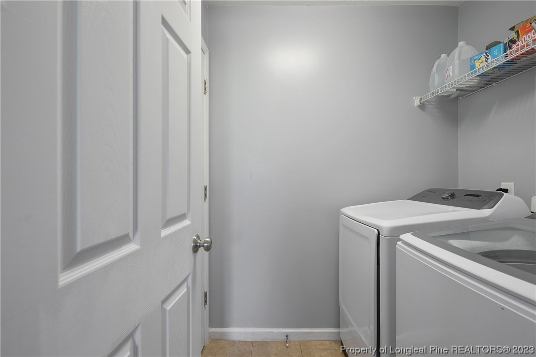 244 Rockingham Street Spring Lake, NC 28390 - Photo 7 of 34 a utility room with dryer and washer
