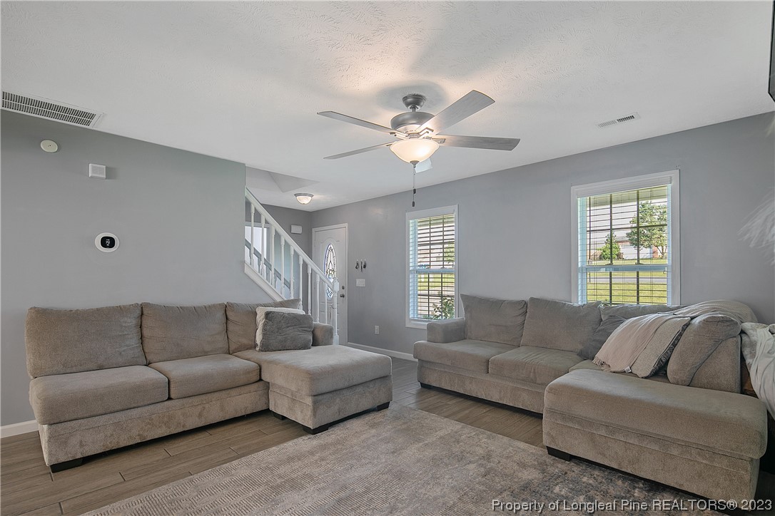 244 Rockingham Street Spring Lake, NC 28390 - Photo 10 of 34 a living room with furniture and a large window