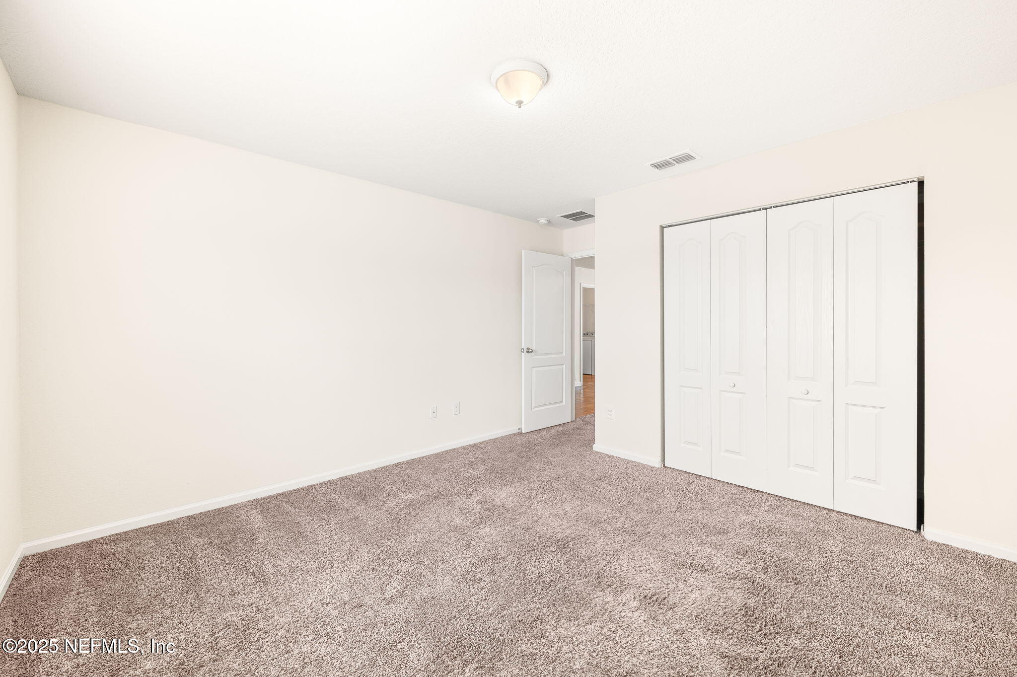 146 Blue Creek Way St. Augustine, FL 32086 - Photo 27 of 38 a view of an empty room