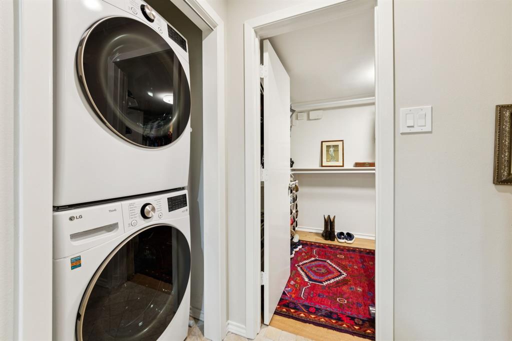 6227 Bandera Avenue, Unit D Dallas, TX 75225 - Photo 14 of 16 a view of a hallway with washer and dryer