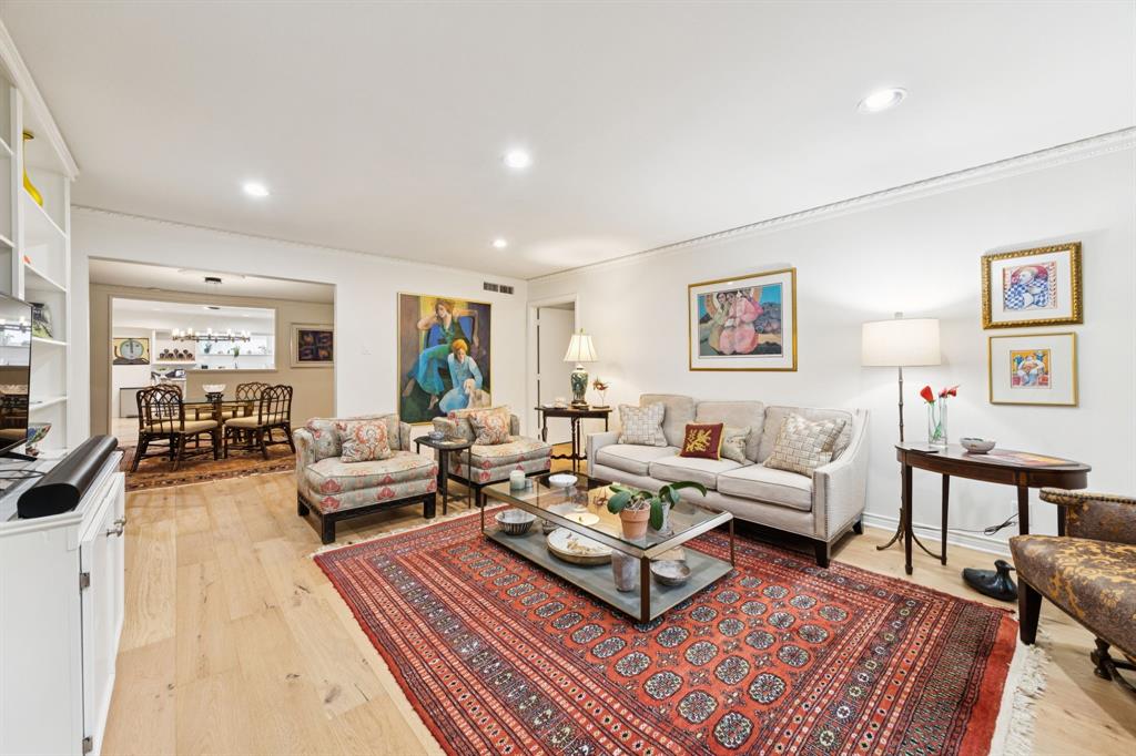 6227 Bandera Avenue, Unit D Dallas, TX 75225 - Photo 2 of 16 a living room with furniture a rug and a table
