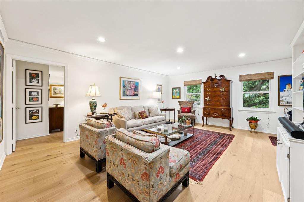 6227 Bandera Avenue, Unit D Dallas, TX 75225 - Photo 3 of 16 a living room with furniture and a flat screen tv