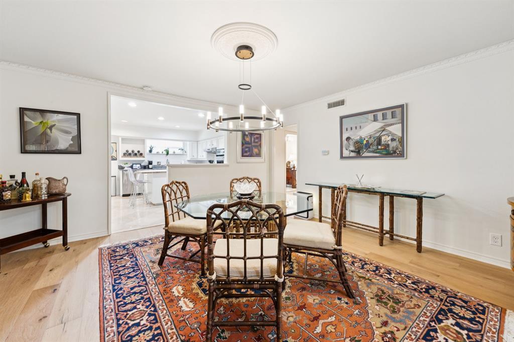 6227 Bandera Avenue, Unit D Dallas, TX 75225 - Photo 5 of 16 a view of a dining room with furniture