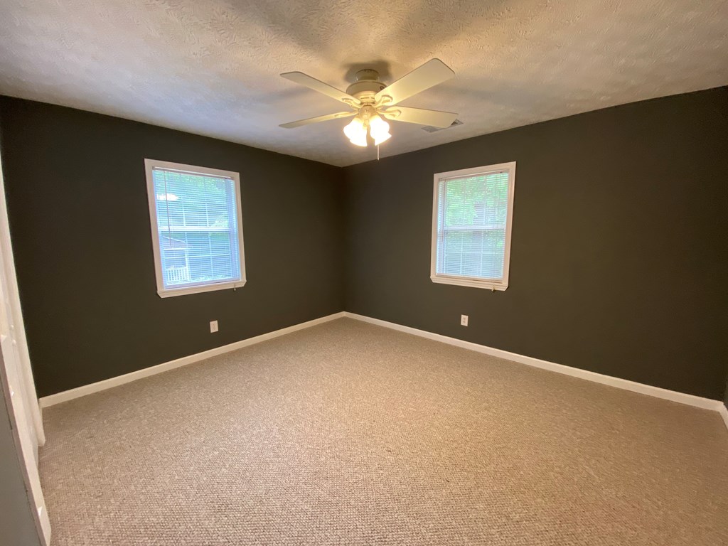 501 Hardy Road LaGrange, GA 30241 - Photo 14 of 37 a view of a livingroom with a ceiling fan and window