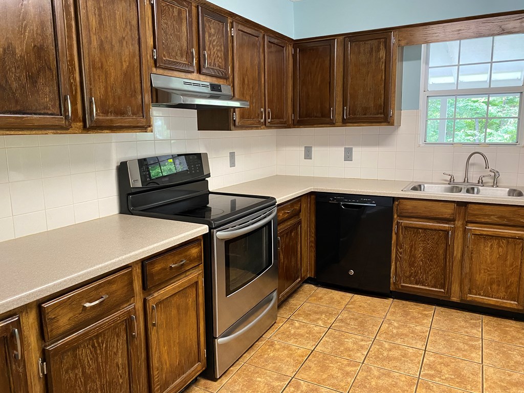 501 Hardy Road LaGrange, GA 30241 - Photo 22 of 37 a kitchen with a sink and cabinets