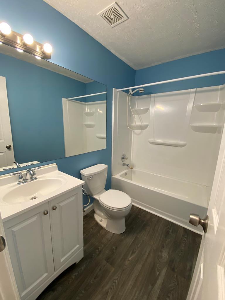 501 Hardy Road LaGrange, GA 30241 - Photo 28 of 37 a bathroom with a double vanity sink toilet and shower