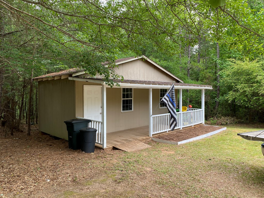 501 Hardy Road LaGrange, GA 30241 - Photo 33 of 37 a view of house with backyard and seating area