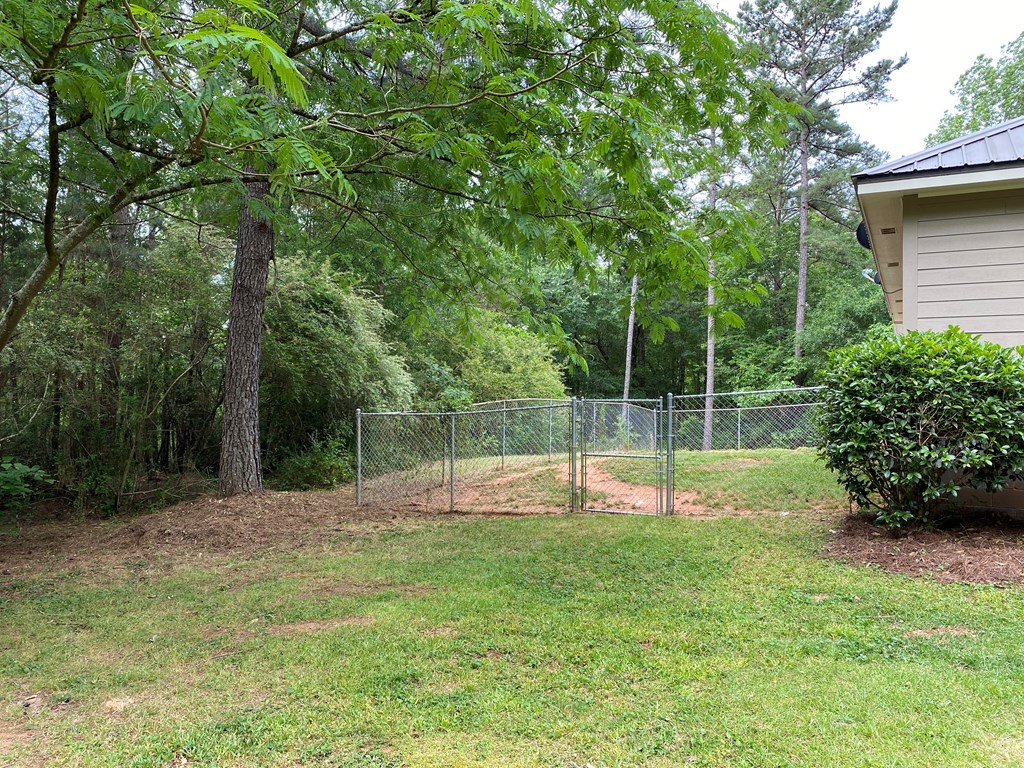 501 Hardy Road LaGrange, GA 30241 - Photo 8 of 37 a view of a backyard with a slide