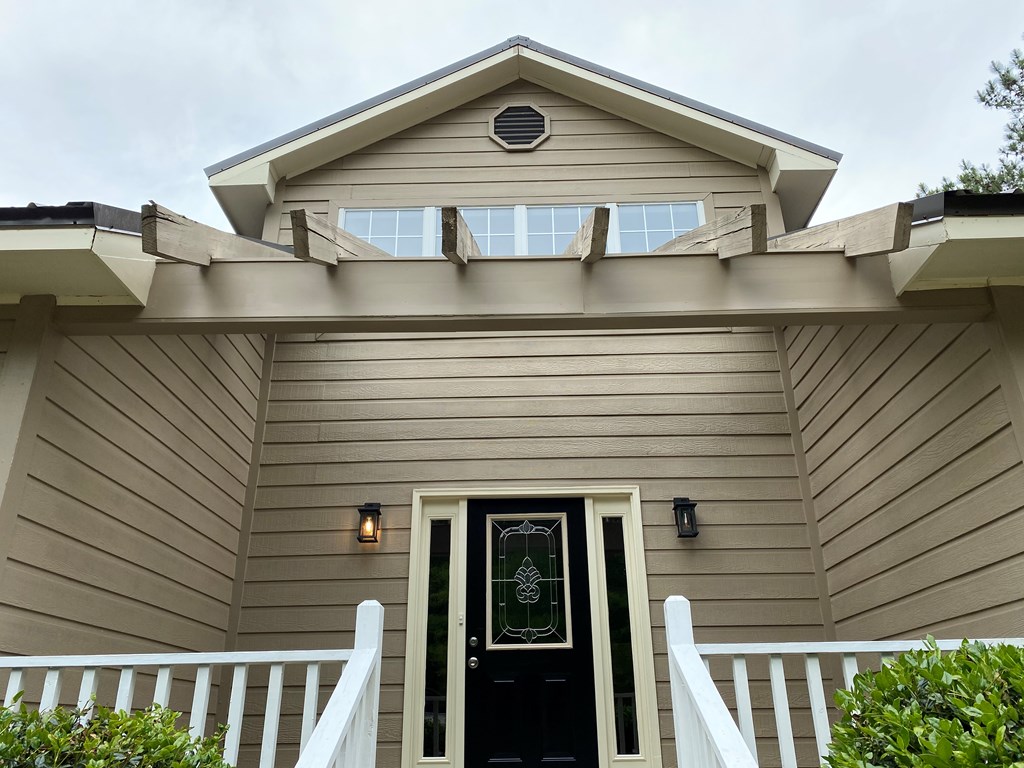 501 Hardy Road LaGrange, GA 30241 - Photo 10 of 37 a front view of a house with glass windows