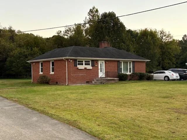 a house view with a garden space