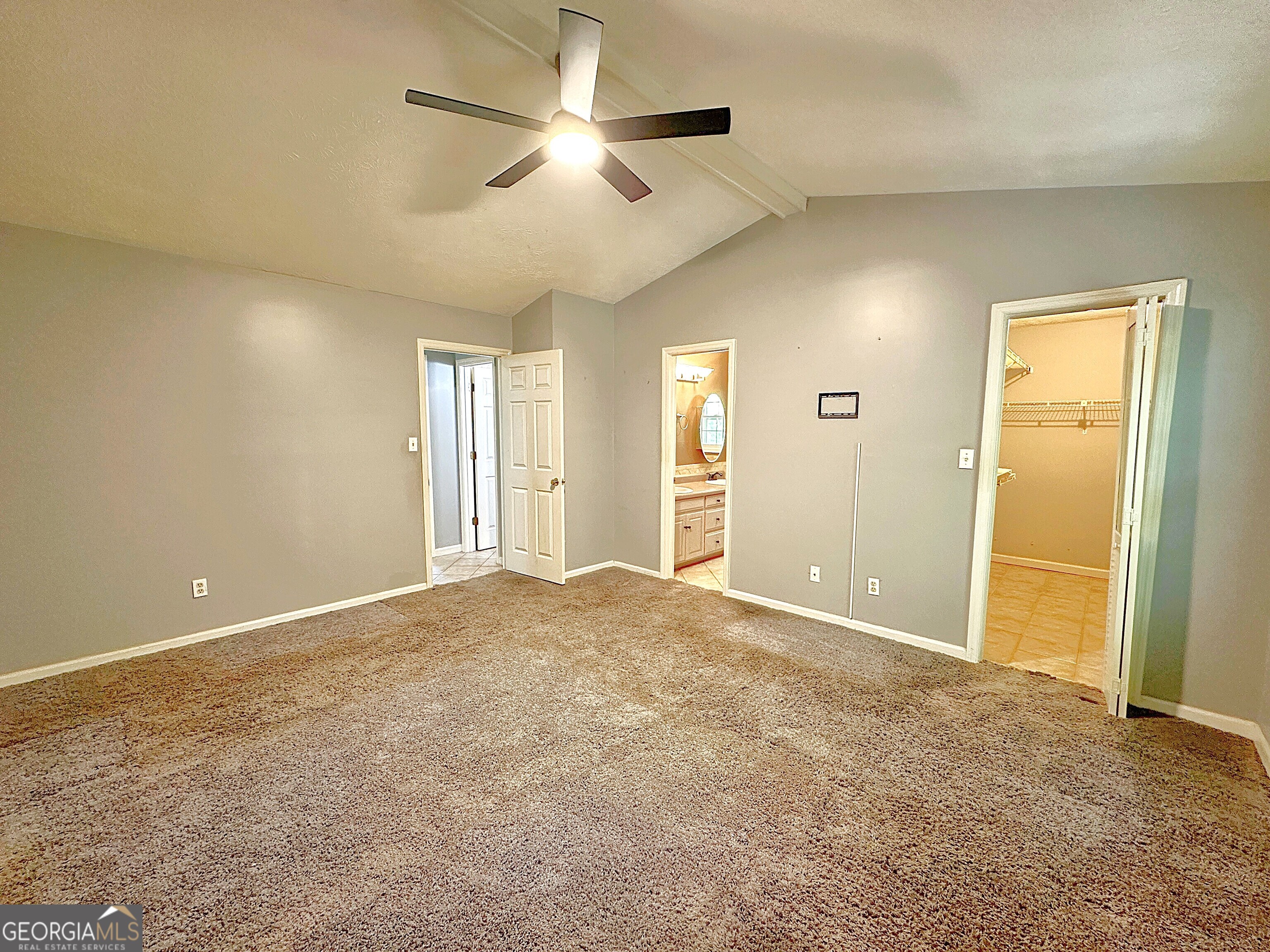 112 Greenbriar Trail LaGrange, GA 30241 - Photo 13 of 29 an empty room with ceiling fan and window