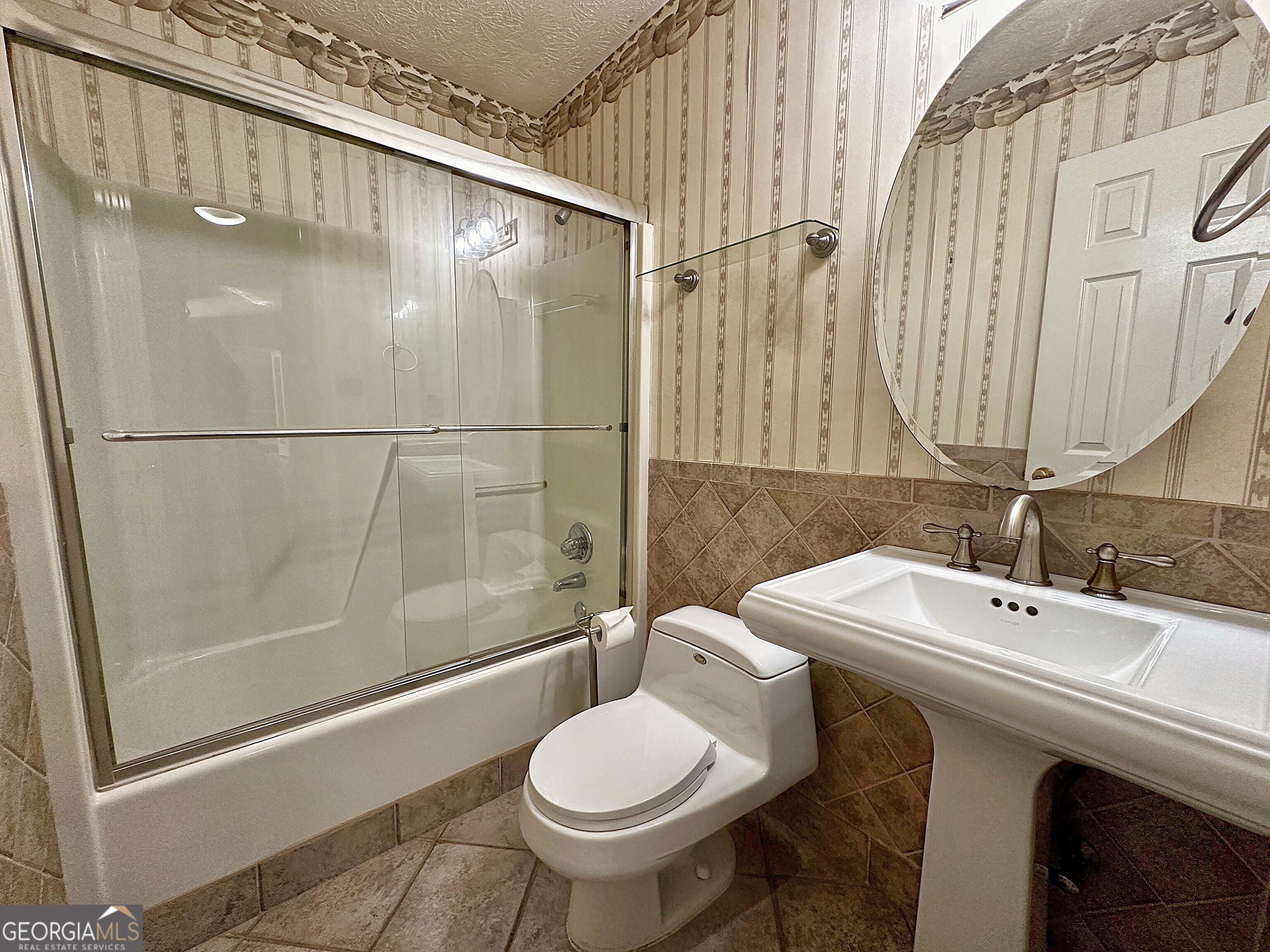 112 Greenbriar Trail LaGrange, GA 30241 - Photo 20 of 29 a bathroom with a sink toilet and shower
