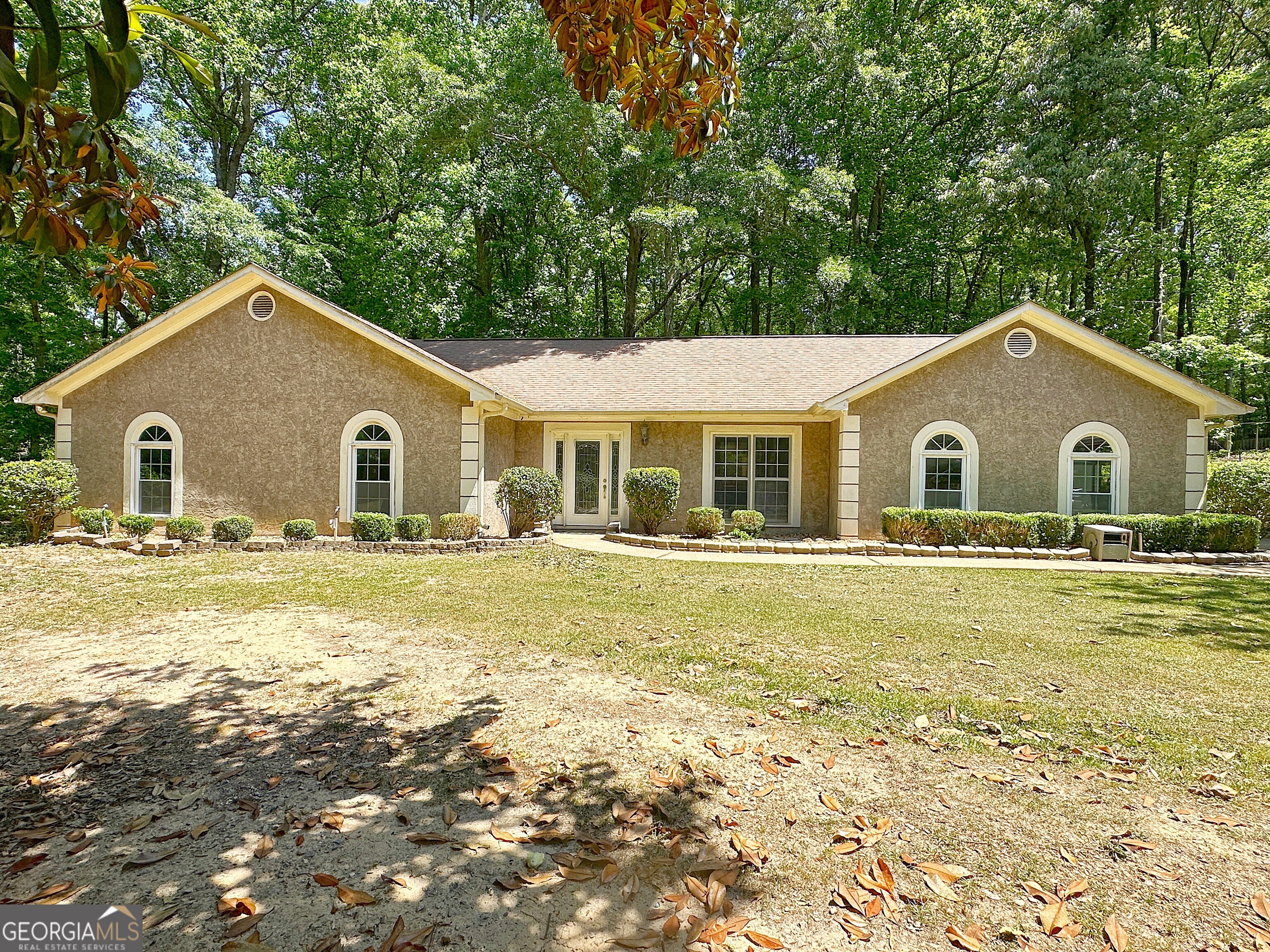 112 Greenbriar Trail LaGrange, GA 30241 - Photo 2 of 29 a house with swimming pool in front of it