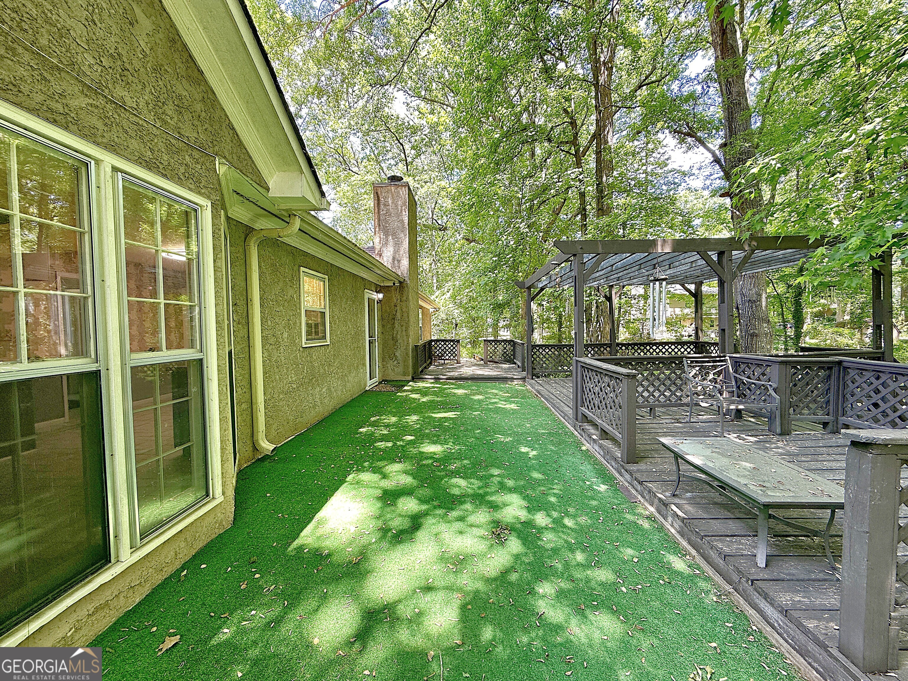 112 Greenbriar Trail LaGrange, GA 30241 - Photo 24 of 29 a backyard of a house with seating space