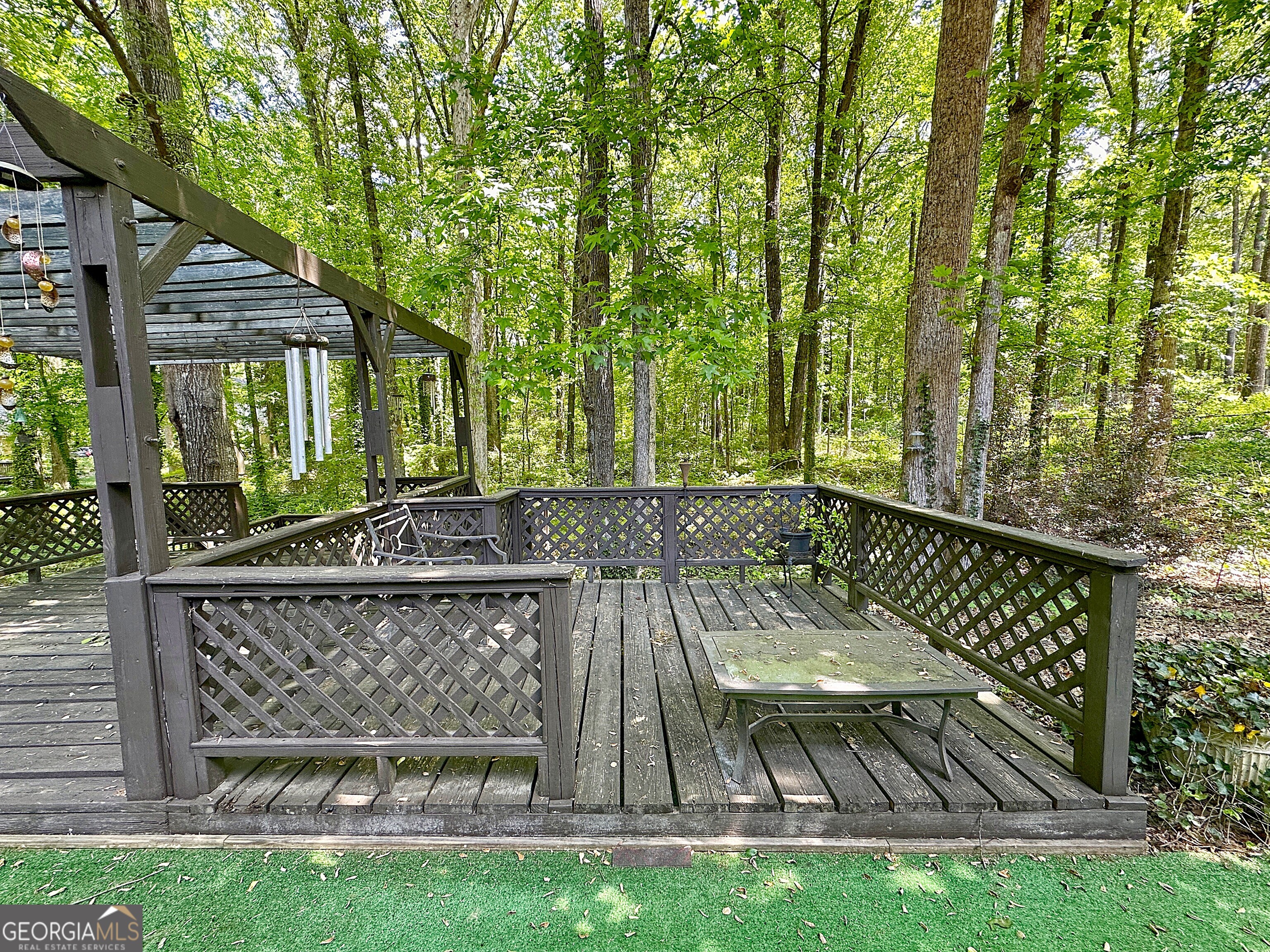112 Greenbriar Trail LaGrange, GA 30241 - Photo 25 of 29 a view of a chairs and table in the backyard