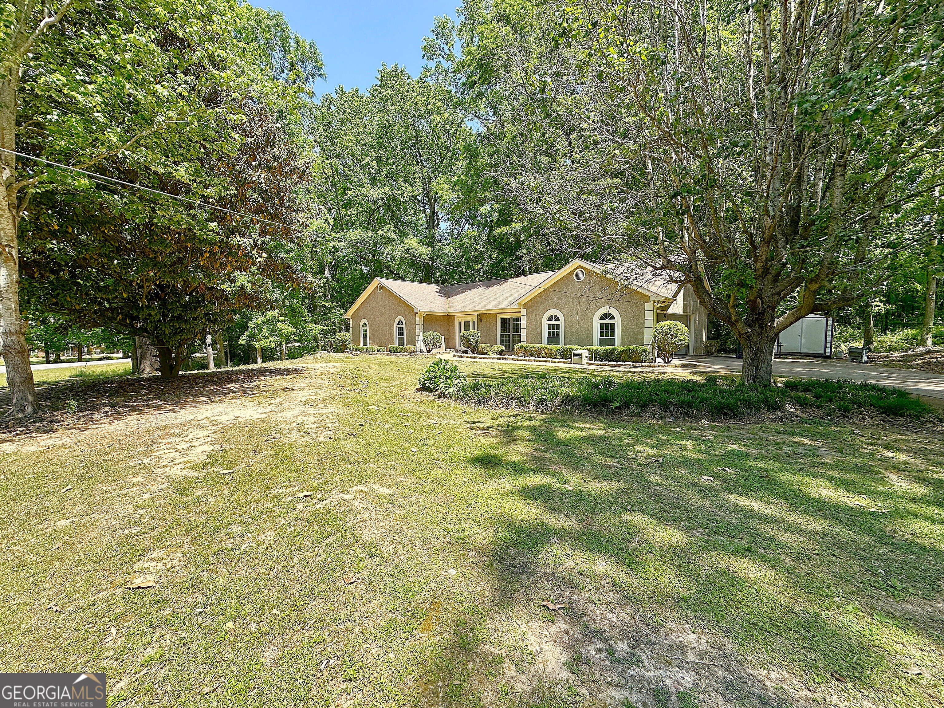 112 Greenbriar Trail LaGrange, GA 30241 - Photo 29 of 29 a swimming pool with trees in the background