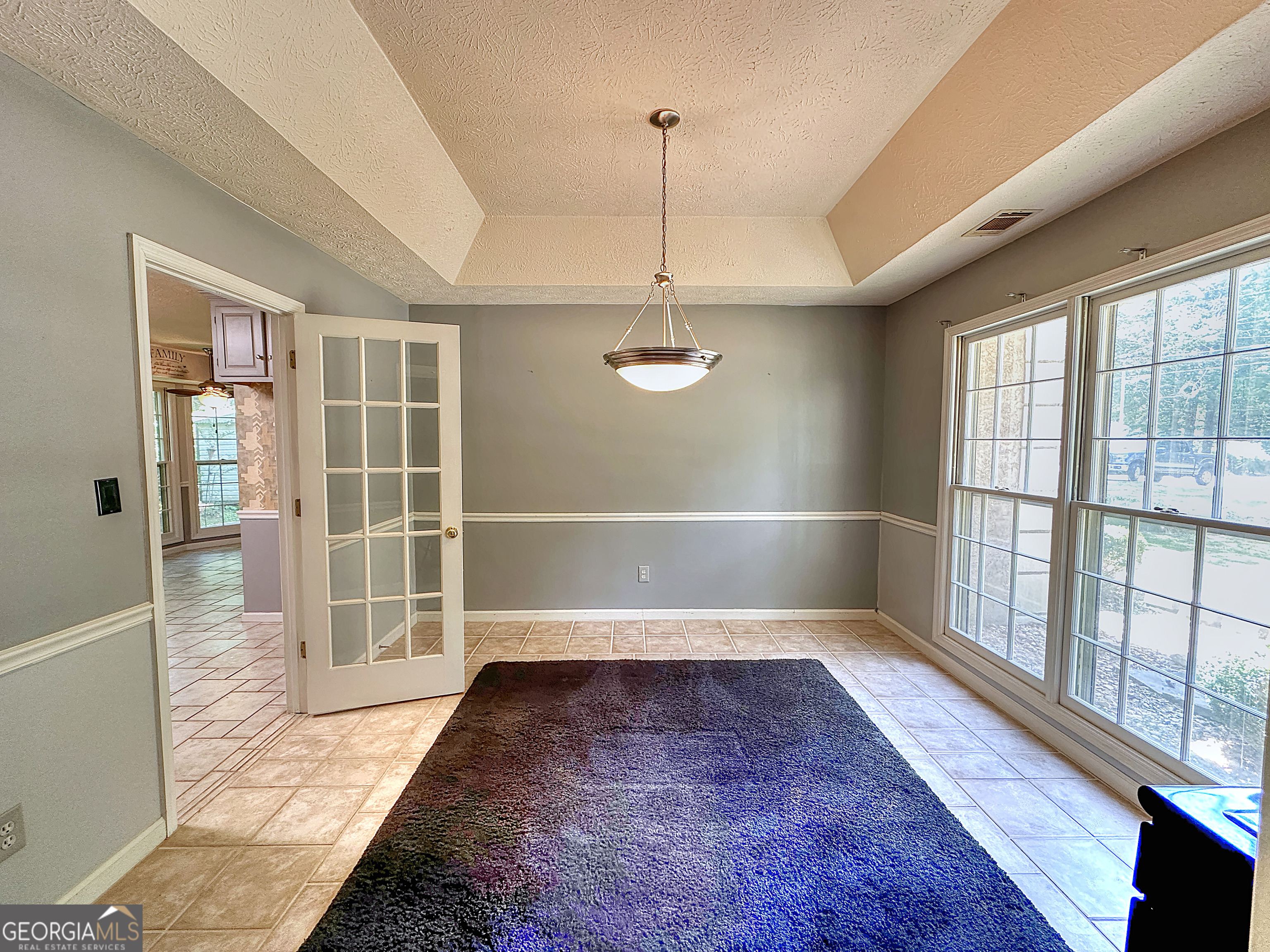 112 Greenbriar Trail LaGrange, GA 30241 - Photo 8 of 29 a view of empty room with wooden floor and fan