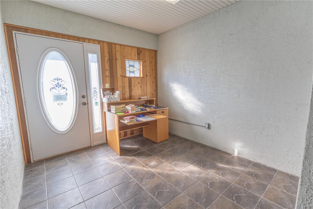 12681 Southeast 54th Avenue Belleview, FL 34420 - Photo 14 of 46 a view of kitchen with washer and dryer