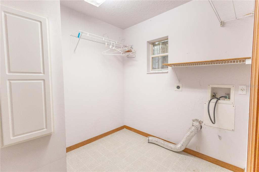 12681 Southeast 54th Avenue Belleview, FL 34420 - Photo 35 of 46 a view of a walk in closet