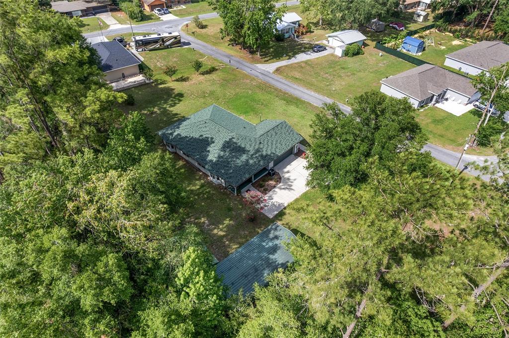 12681 Southeast 54th Avenue Belleview, FL 34420 - Photo 36 of 46 an aerial view of residential houses with outdoor space