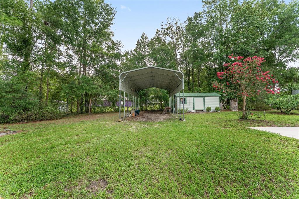 12681 Southeast 54th Avenue Belleview, FL 34420 - Photo 41 of 46 a view of a garden