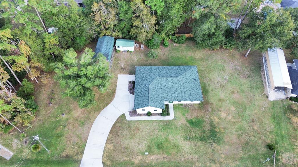 12681 Southeast 54th Avenue Belleview, FL 34420 - Photo 43 of 46 an aerial view of a house