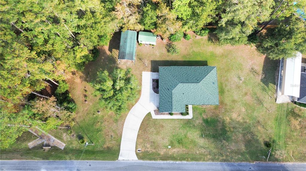 12681 Southeast 54th Avenue Belleview, FL 34420 - Photo 44 of 46 an aerial view of a house with a yard basket ball court