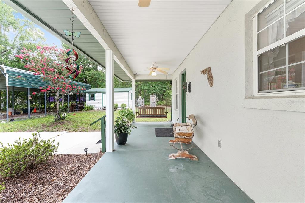 12681 Southeast 54th Avenue Belleview, FL 34420 - Photo 9 of 46 a view of house with outdoor space
