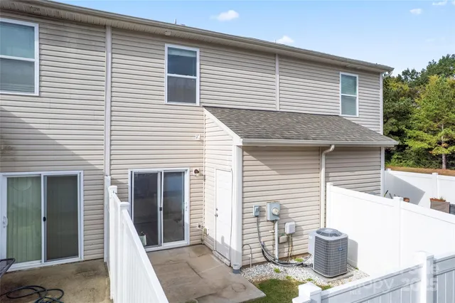 a front view of a house with a garage