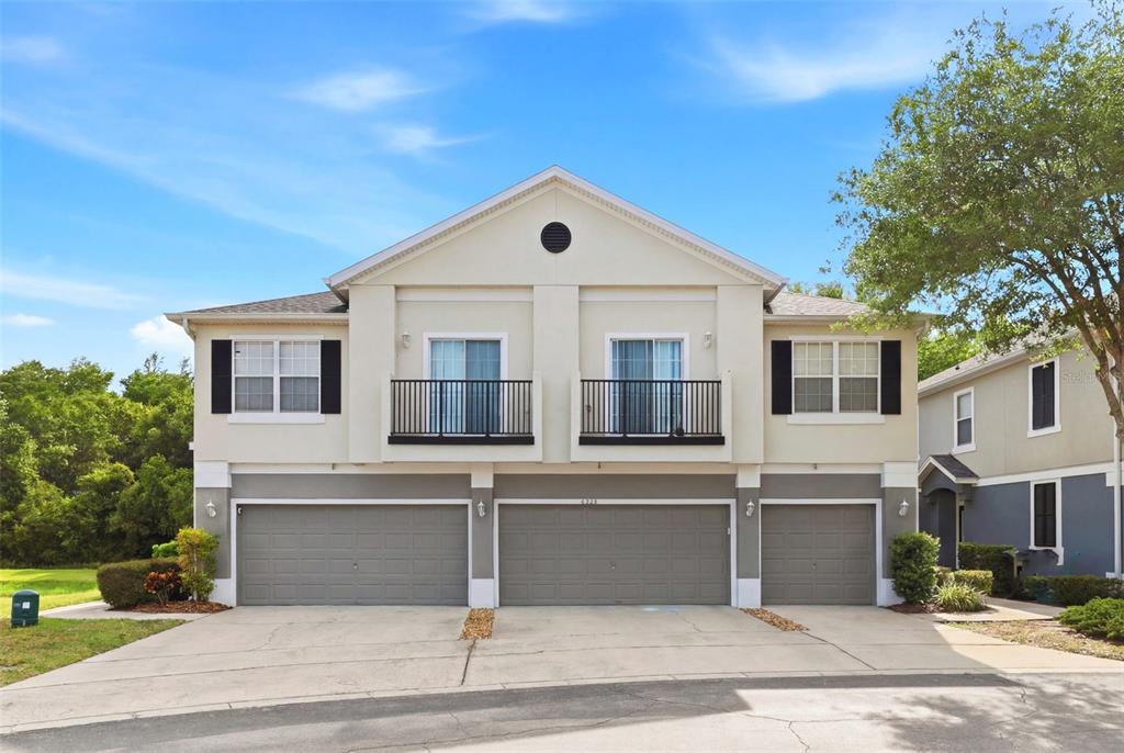 6458 South Goldenrod Road, Unit 29B Orlando, FL 32822 - Photo 1 of 40 a front view of a house with a yard