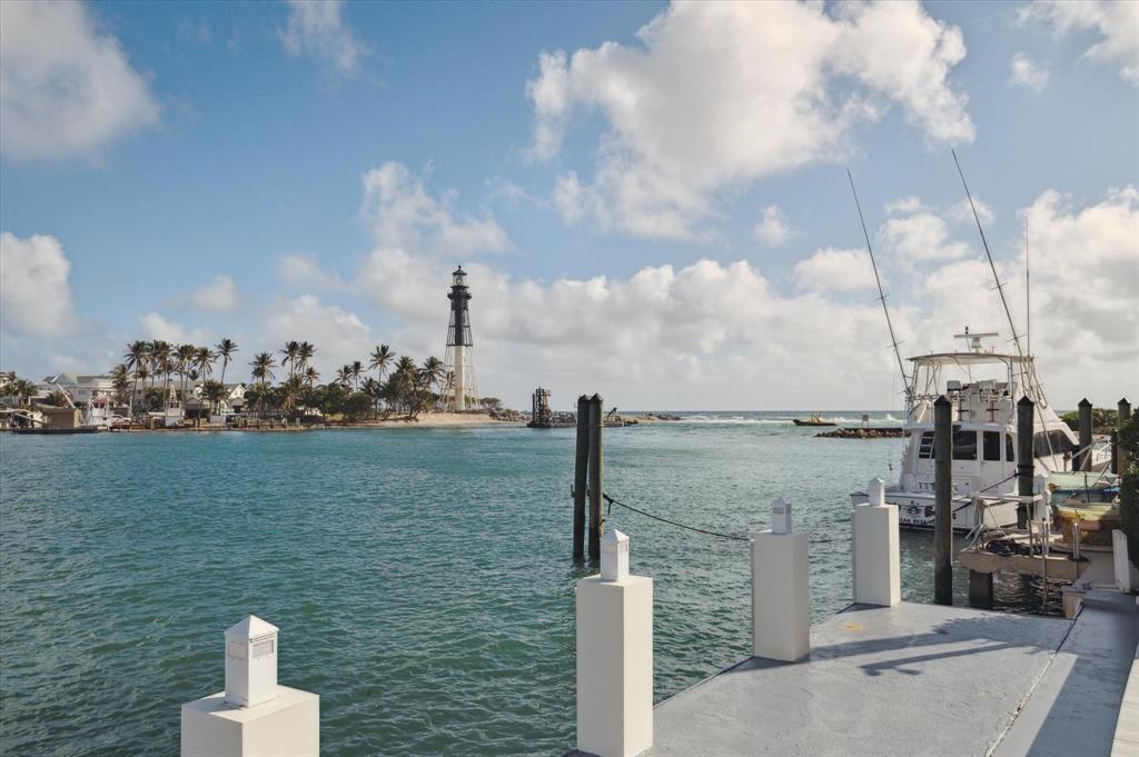 2400 Bay Drive Pompano Beach, FL 33062 - Photo 21 of 55 a view of a lake next to a building