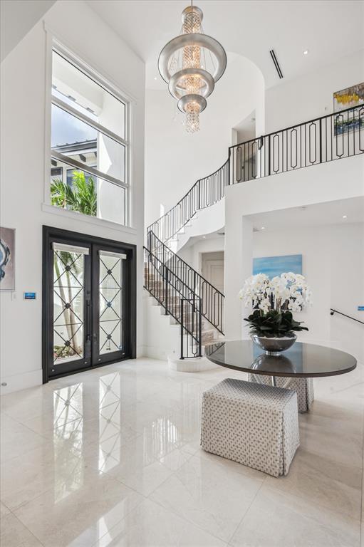 2400 Bay Drive Pompano Beach, FL 33062 - Photo 25 of 55 a view of entryway and hall with wooden floor