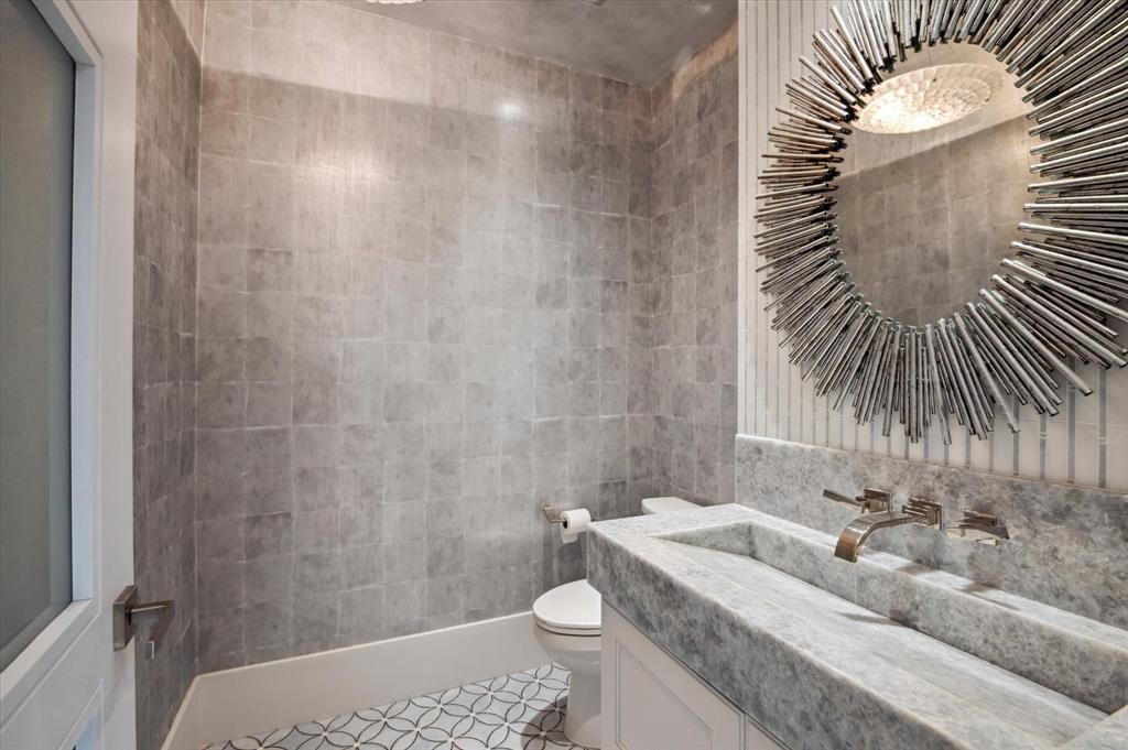 2400 Bay Drive Pompano Beach, FL 33062 - Photo 28 of 55 a bathroom with a sink a toilet and shower