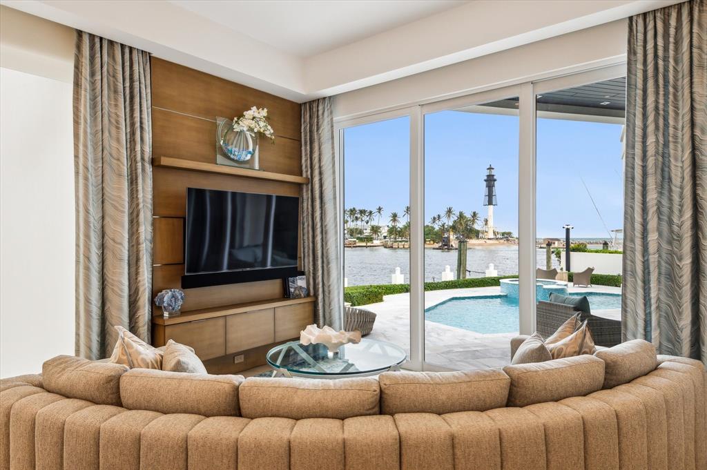 2400 Bay Drive Pompano Beach, FL 33062 - Photo 10 of 55 a living room with furniture and a large window