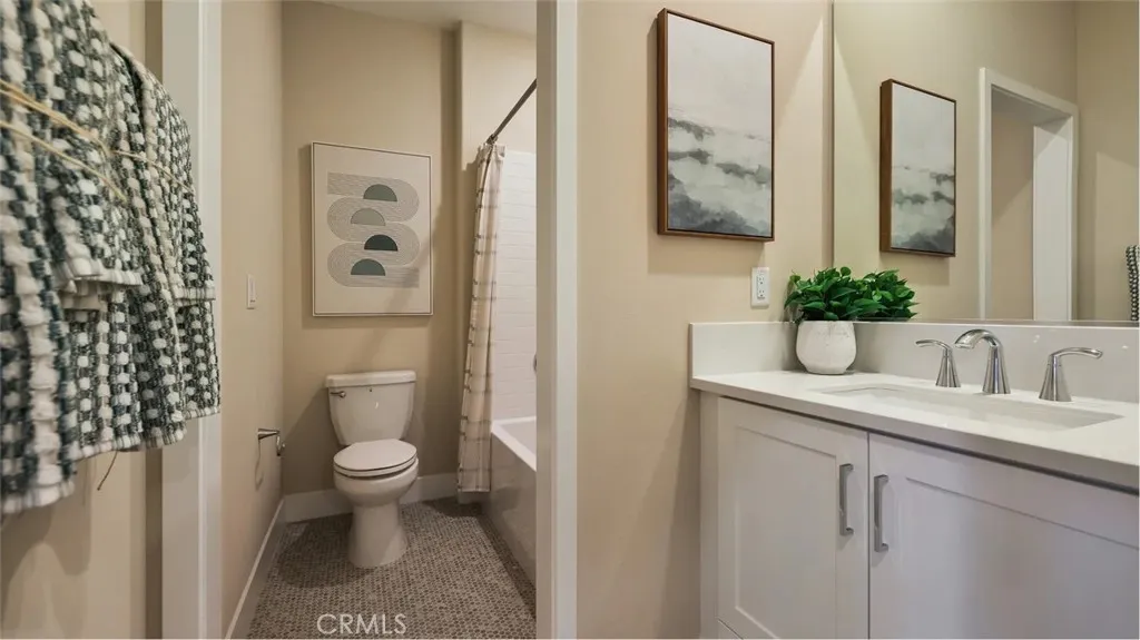 1803 Lychee Street Fullerton, CA 92835 - Photo 18 of 23 a bathroom with a sink a toilet and shower