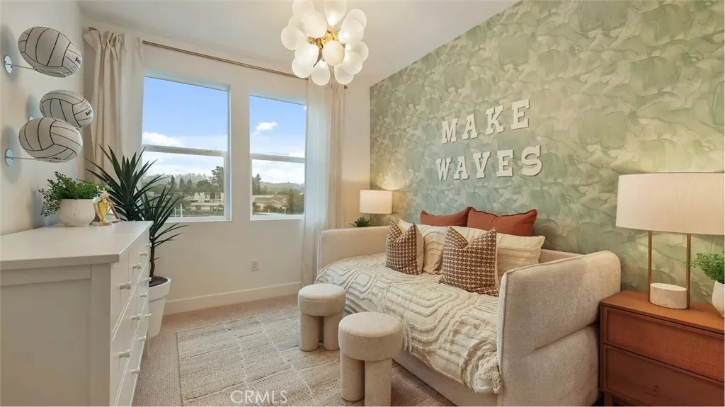 1803 Lychee Street Fullerton, CA 92835 - Photo 19 of 23 a bedroom with a bed and a potted plant on the dresser