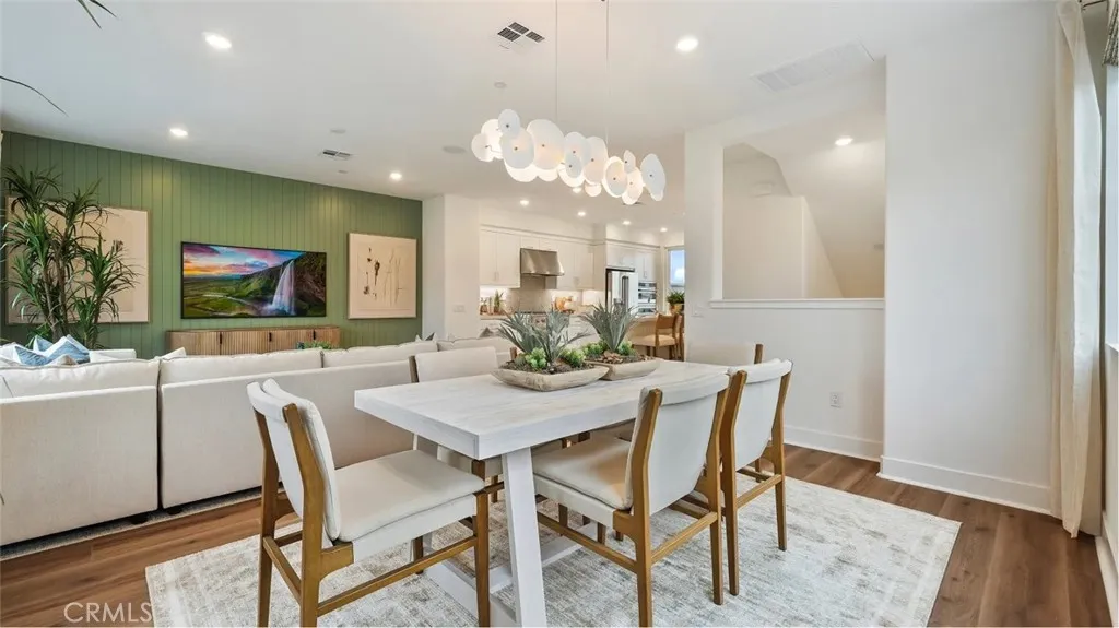 1803 Lychee Street Fullerton, CA 92835 - Photo 7 of 23 a view of a dining room with furniture and wooden floor