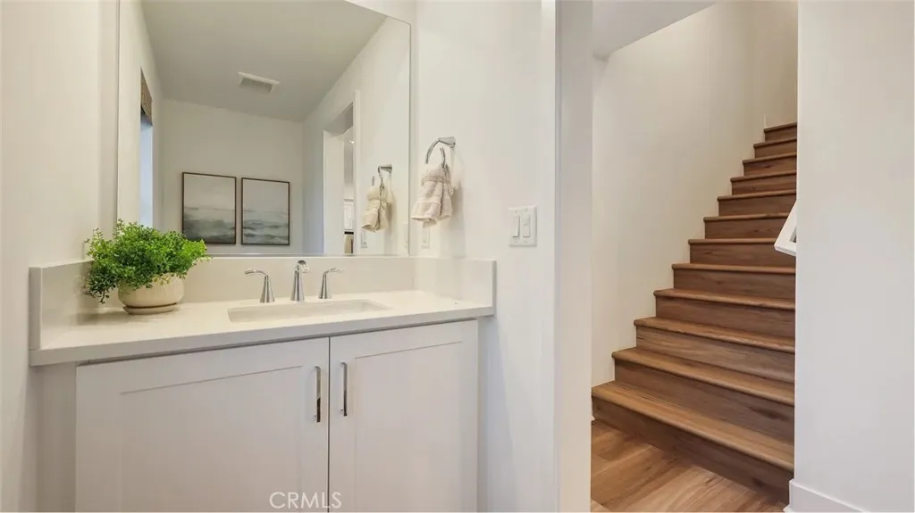 1803 Lychee Street Fullerton, CA 92835 - Photo 9 of 23 a bathroom with a sink and a mirror